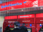 Customers use Bank of America ATMs in New York. The head of the Consumer Financial Protection Bureau says it is looking into ways to help consumers limit their exposure to banks' overdraft fees. Customers use Bank of America ATMs in New York. The head of the Consumer Financial Protection Bureau says it is looking into ways to help consumers limit their exposure to banks' overdraft fees.