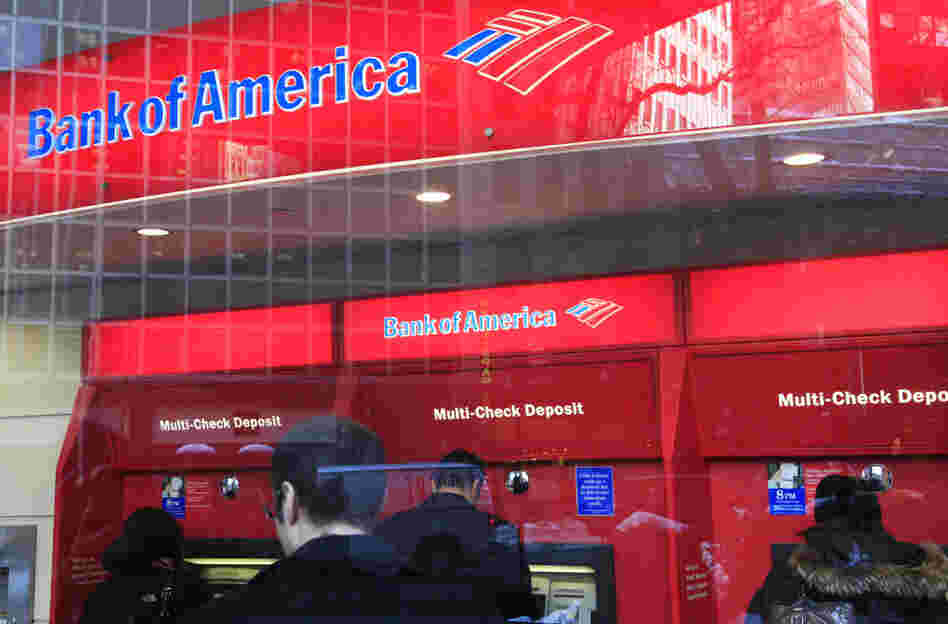 Customers use Bank of America ATMs in New York. The head of the Consumer Financial Protection Bureau says it is looking into ways to help consumers limit their exposure to banks' overdraft fees. Customers use Bank of America ATMs in New York. The head of the Consumer Financial Protection Bureau says it is looking into ways to help consumers limit their exposure to banks' overdraft fees.