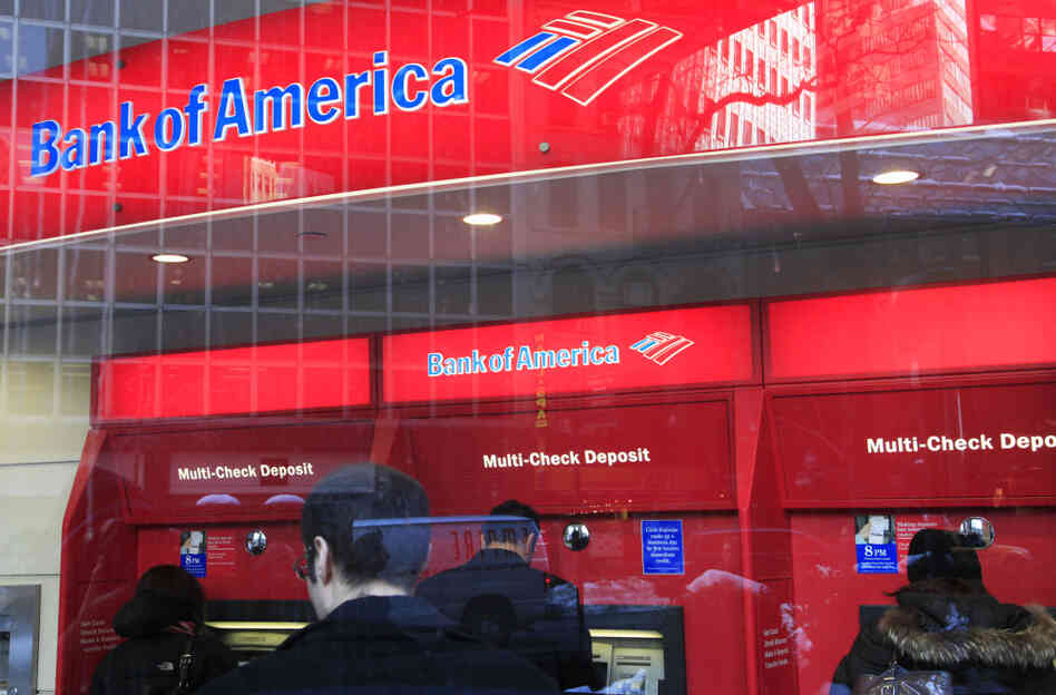 Customers use Bank of America ATMs in New York. The head of the Consumer Financial Protection Bureau says it is looking into ways to help consumers limit their exposure to banks' overdraft fees. Customers use Bank of America ATMs in New York. The head of the Consumer Financial Protection Bureau says it is looking into ways to help consumers limit their exposure to banks' overdraft fees.