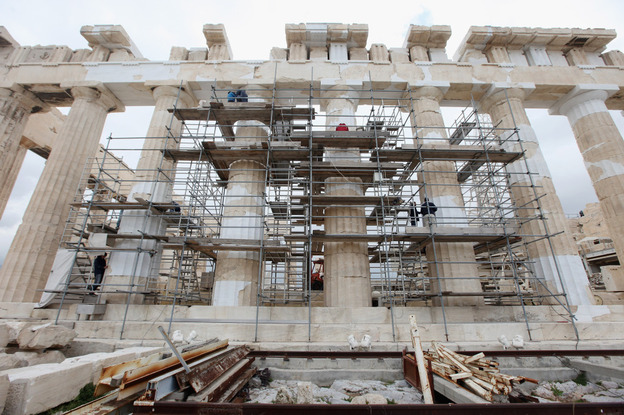 Restoration work on the pillars of the Parthenon atop Athens' Acropolis is symbolic of Europe's recent negotiations to save Greece from default.