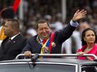 President Hugo Chavez waves during a military parade in Caracas, Venezuela, to commemorate the 20th anniversary of a failed coup attempt he led. After battling cancer last year, Chavez has returned to his high-profile, fiery ways. President Hugo Chavez waves during a military parade in Caracas, Venezuela, to commemorate the 20th anniversary of a failed coup attempt he led. After battling cancer last year, Chavez has returned to his high-profile, fiery ways.