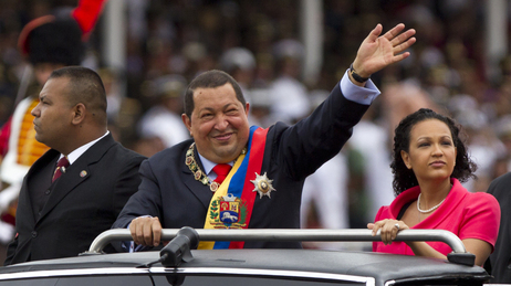 President Hugo Chavez waves during a military parade in Caracas, Venezuela, to commemorate the 20th anniversary of a failed coup attempt he led. After battling cancer last year, Chavez has returned to his high-profile, fiery ways. President Hugo Chavez waves during a military parade in Caracas, Venezuela, to commemorate the 20th anniversary of a failed coup attempt he led. After battling cancer last year, Chavez has returned to his high-profile, fiery ways.