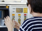 A gas customer views the price on a Shell gas station pump, Tuesday, Feb. 21, 2012 in Del Mar, Calif. A gas customer views the price on a Shell gas station pump, Tuesday, Feb. 21, 2012 in Del Mar, Calif.