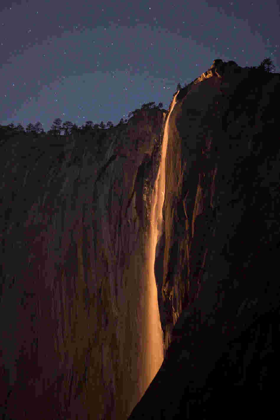 On very rare occasions, the light of a setting moon can create the same fiery effect as that of the setting sun. On very rare occasions, the light of a setting moon can create the same fiery effect as that of the setting sun.