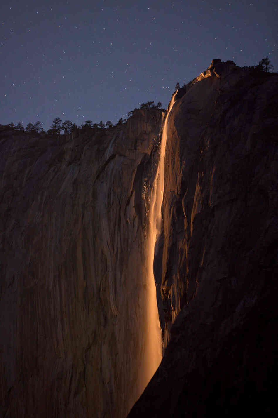 On very rare occasions, the light of a setting moon can create the same fiery effect as that of the setting sun. On very rare occasions, the light of a setting moon can create the same fiery effect as that of the setting sun.