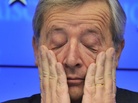 Luxembourg Prime Minister and Eurogroup President Jean-Claude Juncker scratches his eyes during a press conference following the meeting of Eurozone nations earlier today in Brussels. 