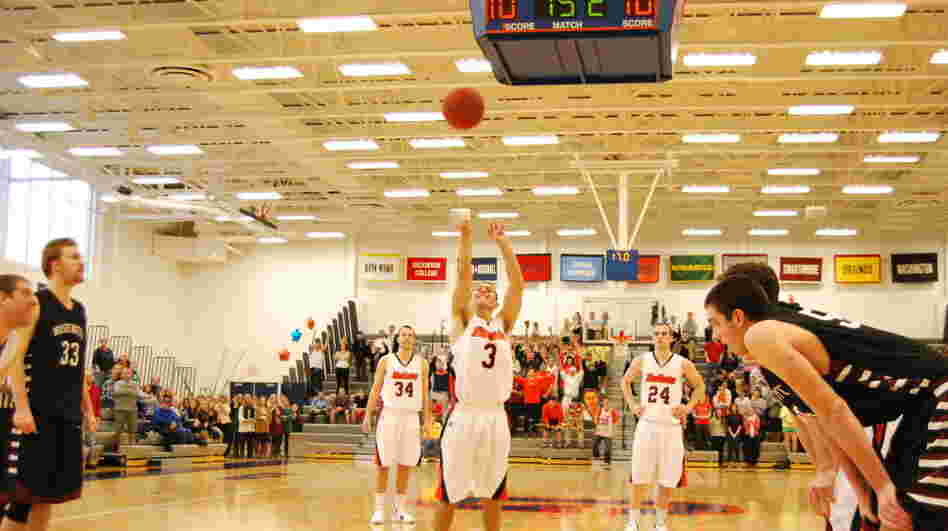 Senior Cory Weissman (center) of Gettysburg College, takes his second free-throw shot in a Division III Centennial Conference game against Washington College.