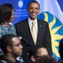 President Obama and first lady Michelle Obama listen as a choir performs during the groundbreaking ceremony for the Smithsonian National Museum of African American History and Culture in Washington, D.C., on Wednesday.