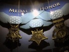 The Supreme Court heard arguments over whether it should be a crime to lie about receiving military medals. Here replicas of the medals hang at the Medal of Honor Museum. The Supreme Court heard arguments over whether it should be a crime to lie about receiving military medals. Here replicas of the medals hang at the Medal of Honor Museum.