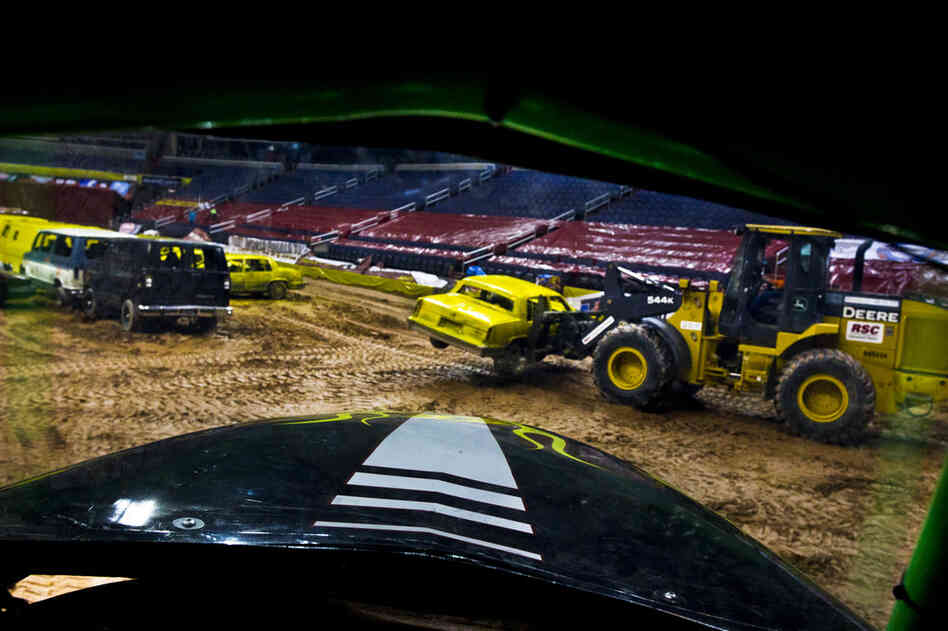 The Grave Digger #18 was constructed from a 1950 Chevy Panel Van with a 540 CI size engine and a Coan 2-speed transmission. Sitting in the driver's seat of the car, one sees the immensity of the estimated 10,000 lbs. truck — standing at about 11 ft tall and 12 ft wide.