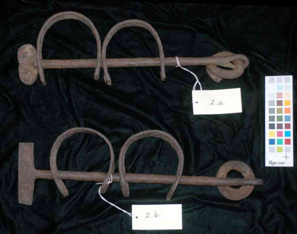 Leg ShacklesThese slave shackles were likely crafted in Africa rather than Europe because they are relatively cumbersome to close and open. Europeans would have instead closed the shackles with a padlock. The size of the shackle loops indicates they were used on legs rather than arms.