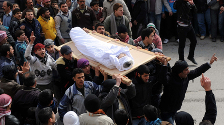 Syrians today carried the body of a youth reportedly killed in violence in the Idlib region. Syrians today carried the body of a youth reportedly killed in violence in the Idlib region.