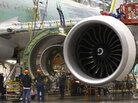 Boeing employees work on a plane engine at the company's factory in Everett, Wash. The Obama administration's corporate tax cut proposal would offer even deeper cuts for U.S. manufacturers like Boeing. Boeing employees work on a plane engine at the company's factory in Everett, Wash. The Obama administration's corporate tax cut proposal would offer even deeper cuts for U.S. manufacturers like Boeing.