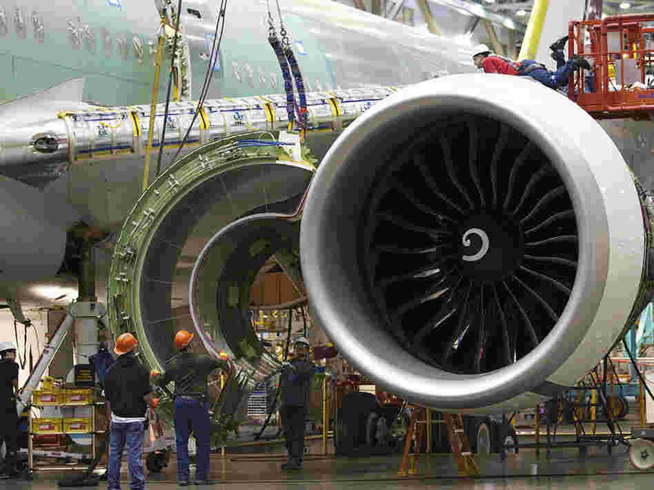 Boeing employees work on a plane engine at the company's factory in Everett, Wash. The Obama administration's corporate tax cut proposal would offer even deeper cuts for U.S. manufacturers like Boeing. Boeing employees work on a plane engine at the company's factory in Everett, Wash. The Obama administration's corporate tax cut proposal would offer even deeper cuts for U.S. manufacturers like Boeing.