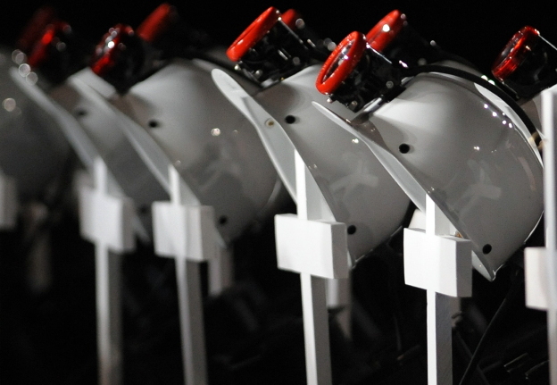 At an April 25, 2010, service in Beckley, W. Va., for the 29 miners killed in the Upper Big Branch explosion, helmets — placed on crosses — were lined up in their honor. 