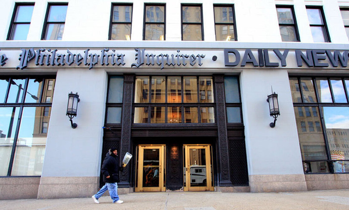 The publisher of the Philadelphia Inquirer and the Philadelphia Daily News has been accused of interfering with coverage of the newspapers' pending sale. 