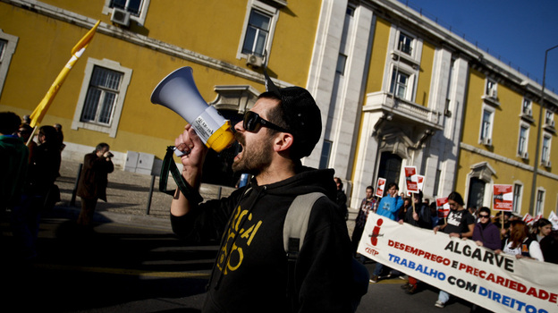Protesters against government austerity measures march in front of the Finance Ministry in Lisbon, Portugal, earlier this month. The country's debt crisis has prompted Portuguese workers to look to their country's former colonies for jobs. Protesters against government austerity measures march in front of the Finance Ministry in Lisbon, Portugal, earlier this month. The country's debt crisis has prompted Portuguese workers to look to their country's former colonies for jobs.