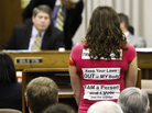 An abortion rights activist speaks before the Virginia Senate Education and Health Committee on Thursday. Following a protest outside the state capitol and criticism from moderates in his own party, Republican Gov. Bob McDonnell asked for revisions to a bill requiring an invasive ultrasound before an abortion. An abortion rights activist speaks before the Virginia Senate Education and Health Committee on Thursday. Following a protest outside the state capitol and criticism from moderates in his own party, Republican Gov. Bob McDonnell asked for revisions to a bill requiring an invasive ultrasound before an abortion.