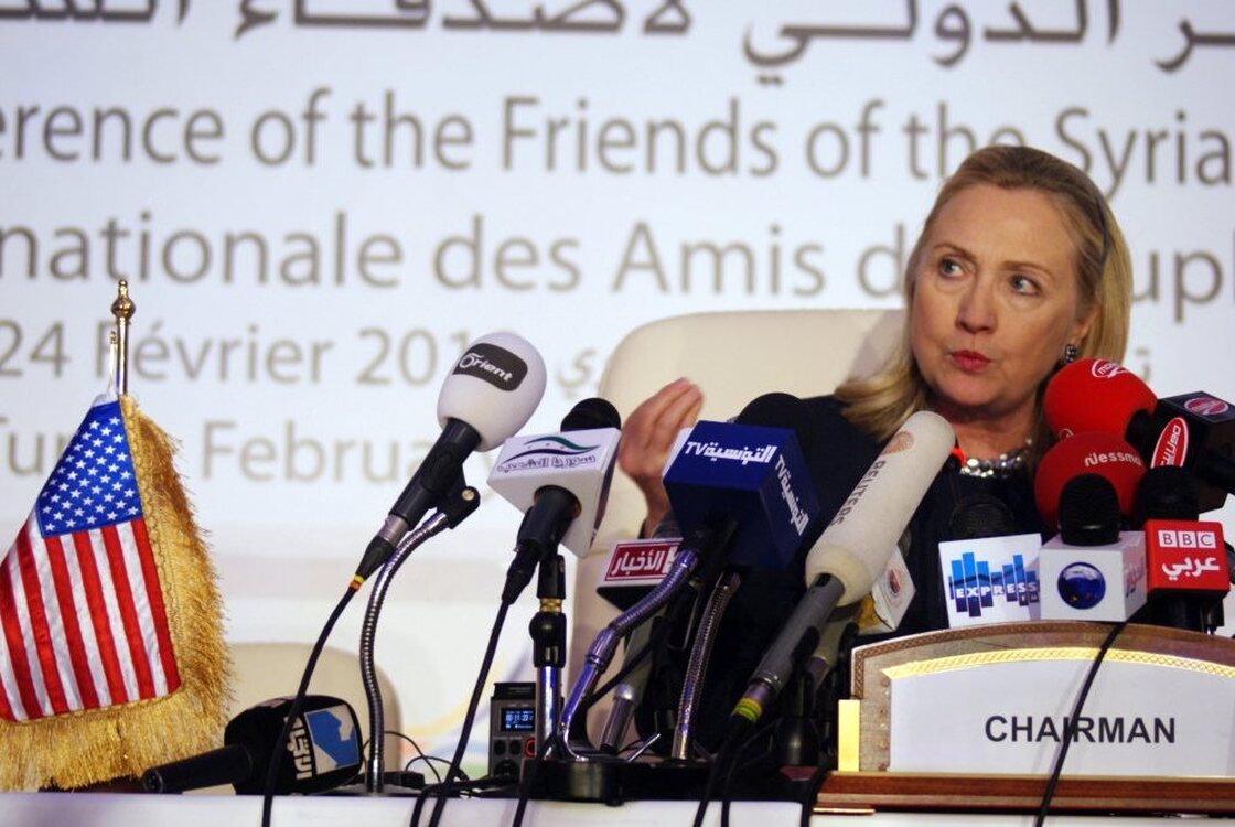 Secretary of State Hillary Clinton speaks during a press conference at a conference on Syria in Tunis, Tunisia, on Friday. The participants were united in their calls for a ceasefire and for Syrian President Bashar Assad to allow humanitarian aid into his country.