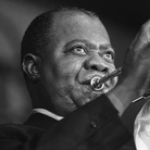 Louis Armstrong during a concert in Paris, June 1965. Louis Armstrong during a concert in Paris, June 1965.