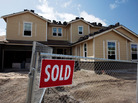 A sign of the times at a new housing development in Danville, Calif., last year. A sign of the times at a new housing development in Danville, Calif., last year.
