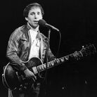 Paul Simon performing in London.