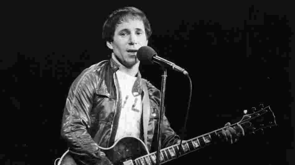 Paul Simon performing in London.