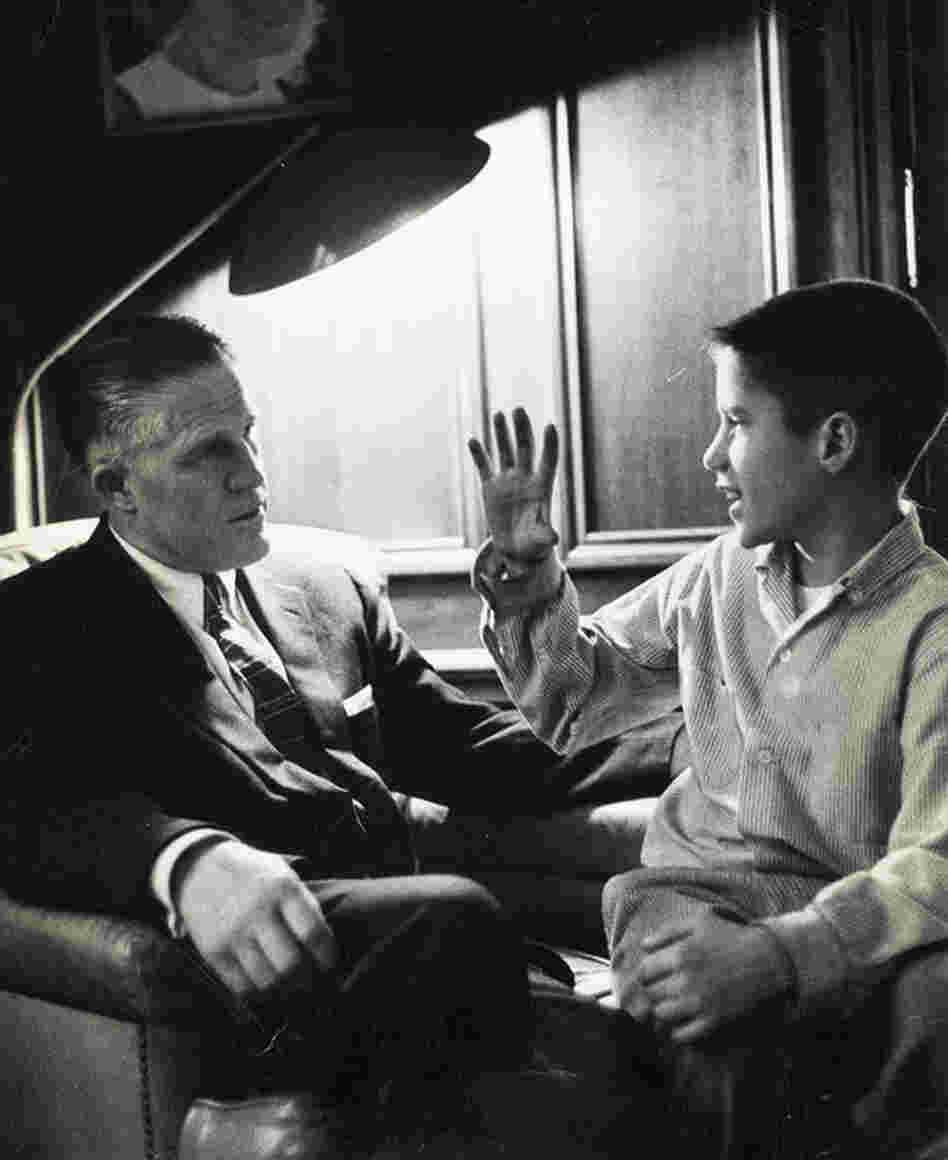 Mitt with his father in their Detroit home in 1957, when George Romney was CEO of American Motors Corp. 
