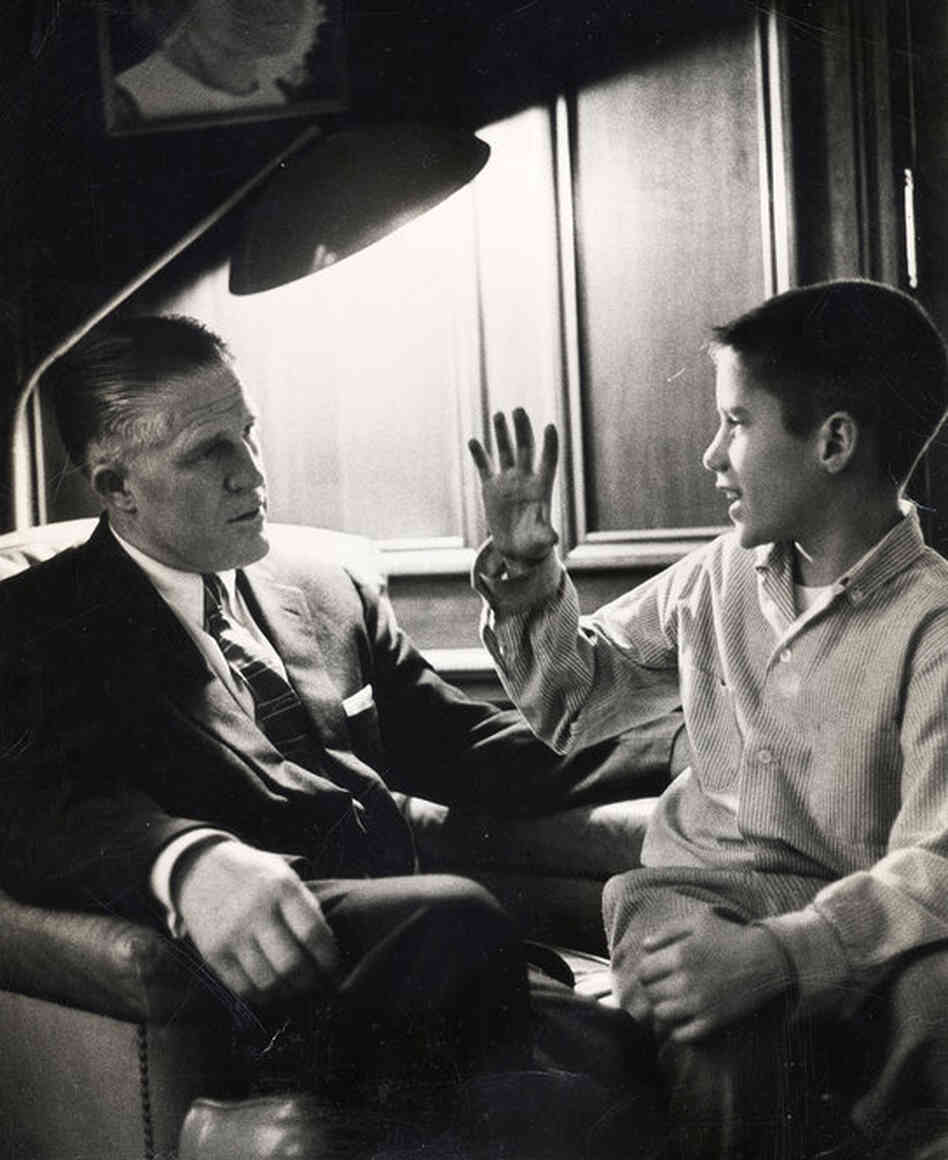 Mitt with his father in their Detroit home in 1957, when George Romney was CEO of American Motors Corp. 