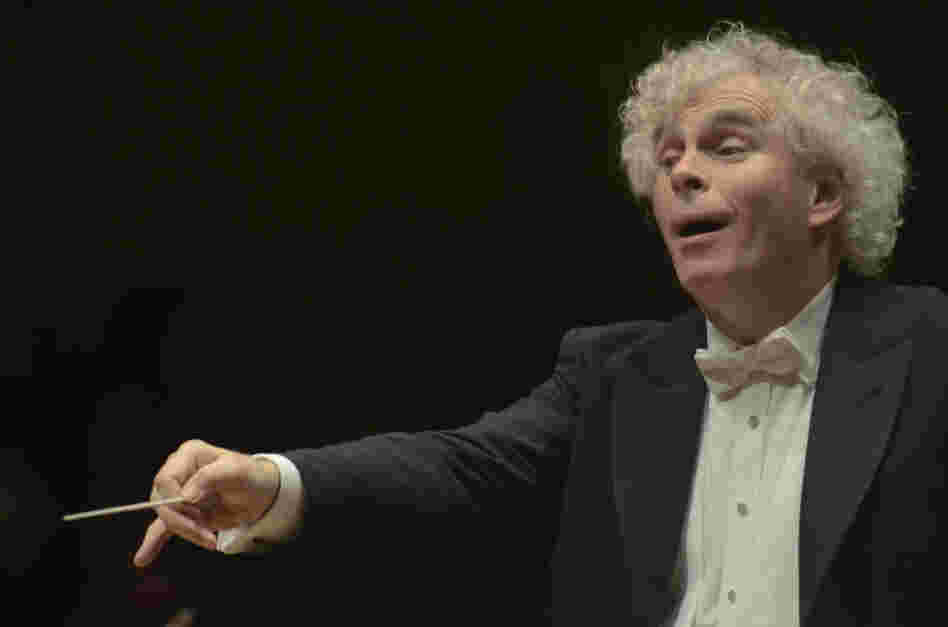 Simon Rattle at the podium — he conducted the nearly 90-minute symphony entirely from memory.