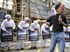 Protesters demonstrate against Foxconn, which manufactures Apple products in China, outside an Apple retail outlet in Hong Kong. Protesters demonstrate against Foxconn, which manufactures Apple products in China, outside an Apple retail outlet in Hong Kong.