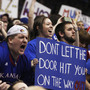 Kansas fans celebrate during the second half of an NCAA college basketball game against Missouri in Lawrence, Kan., on Saturday. Kansas defeated Missouri 87-86 in overtime. Kansas fans celebrate during the second half of an NCAA college basketball game against Missouri in Lawrence, Kan., on Saturday. Kansas defeated Missouri 87-86 in overtime.