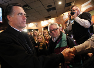 Mitt Romney greets patrons at a restaurant called The Mitt in Mount Clemens, Mich., on Friday. The candidate hasn't done as much handshaking lately, given the size of the recent primary states. Mitt Romney greets patrons at a restaurant called The Mitt in Mount Clemens, Mich., on Friday. The candidate hasn't done as much handshaking lately, given the size of the recent primary states.