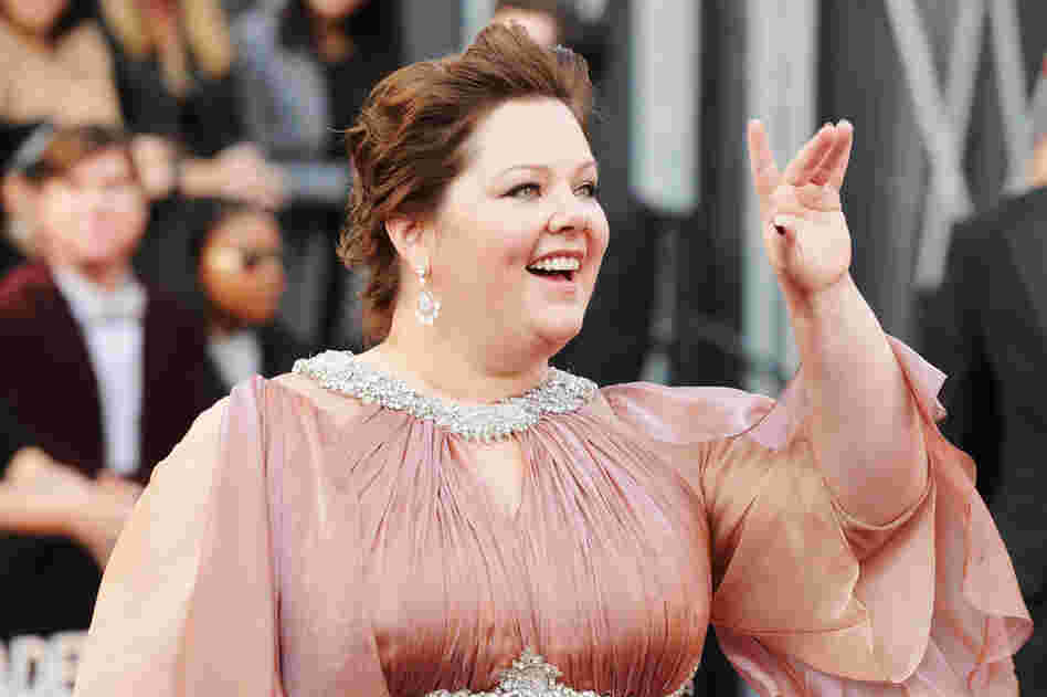 Melissa McCarthy, up for Best Supporting Actress for her Role in Bridesmaids, waves to the crowd. 