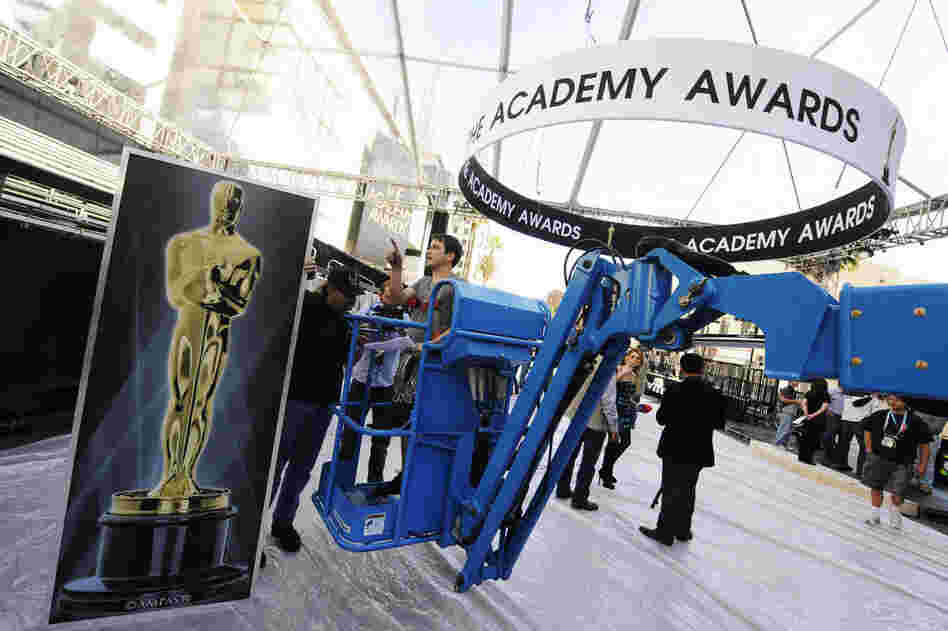 The Academy Awards banner hangs over where the red carpet will be placed at the entrance of the Kodak Theater. 