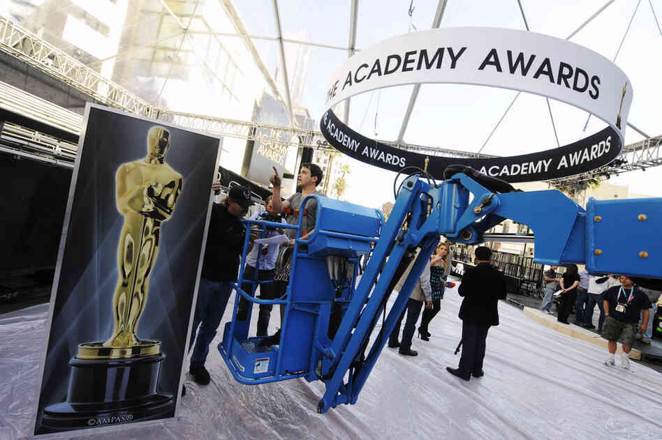 The Academy Awards banner hangs over where the red carpet will be placed at the entrance of the Kodak Theater. 