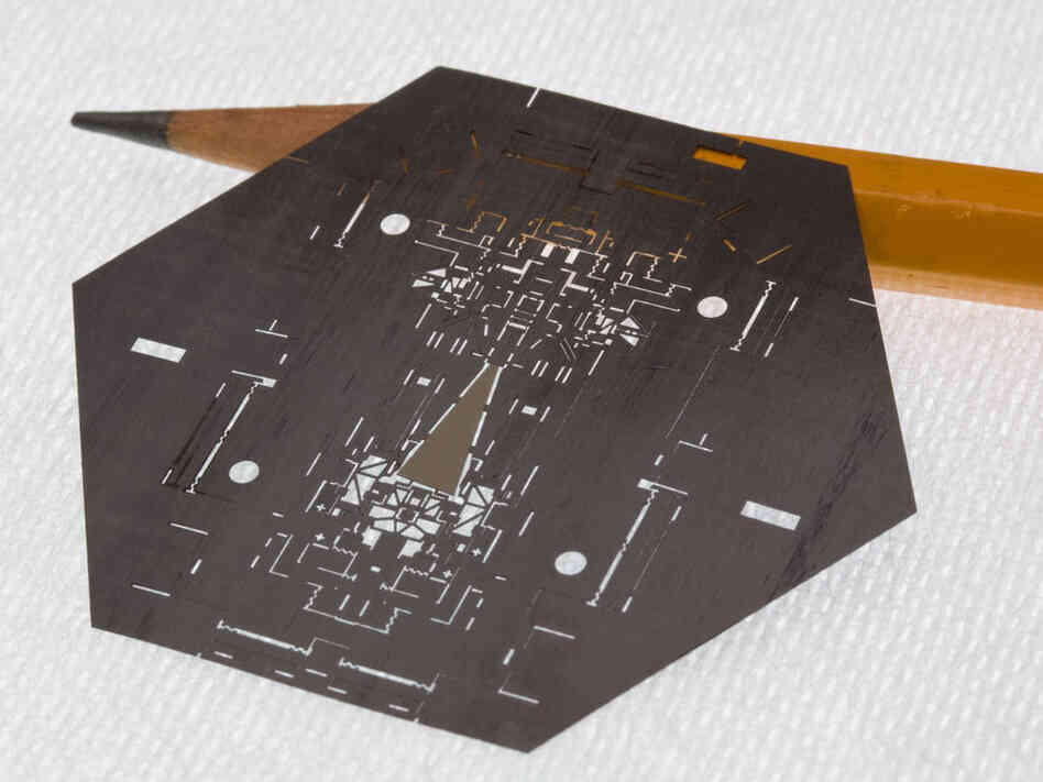 A laser-milled sheet of carbon fiber, one layer of the stack that makes up a Mobee.