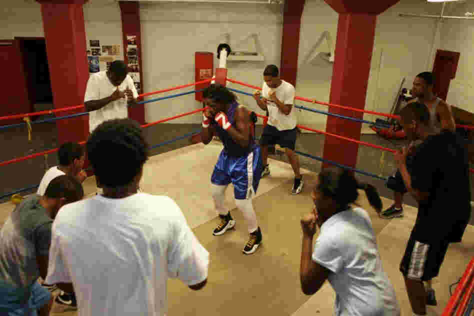 "They have to look at me like their sister," Claressa says of the boxers she trains with. "No dating or you get put out of the gym. You don't want to mix biz with pleasure."