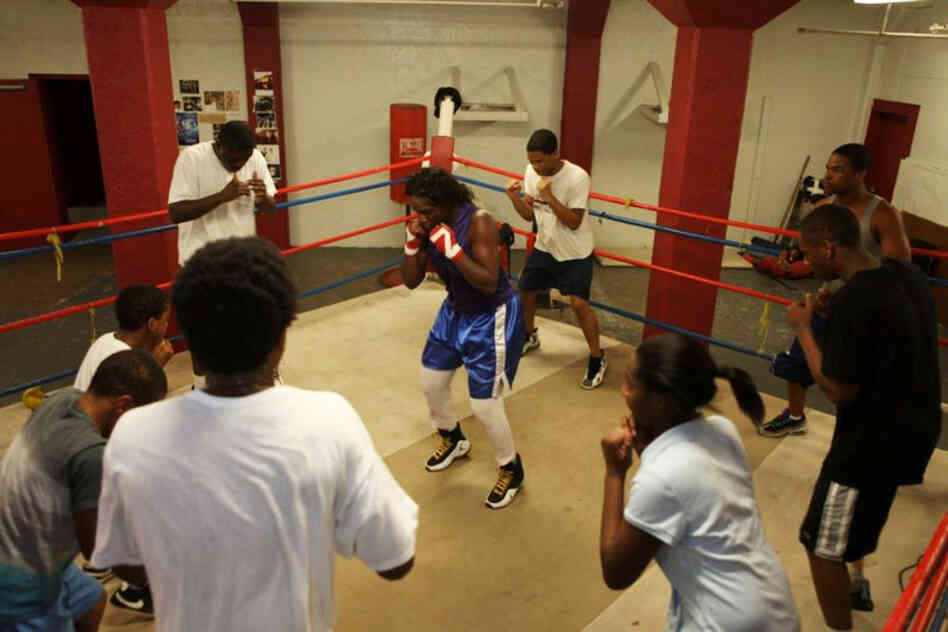 "They have to look at me like their sister," Claressa says of the boxers she trains with. "No dating or you get put out of the gym. You don't want to mix biz with pleasure."