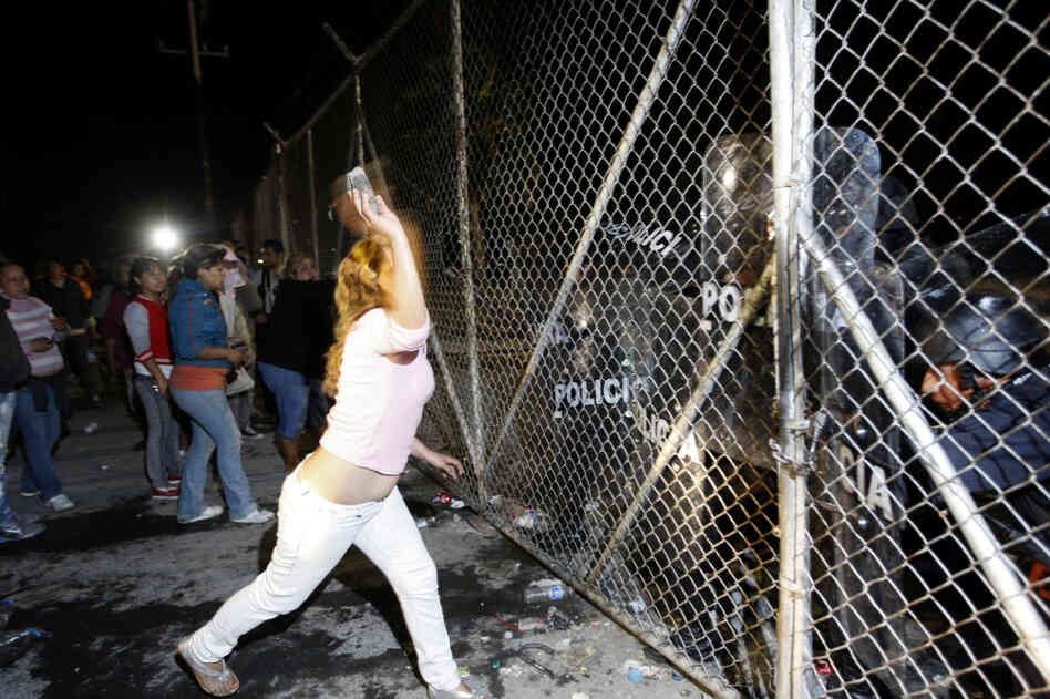 In northern Mexico, relatives of inmates at Apodaca prison outside Monterrey attack the security fence, Feb. 21. Violence at the prison on Feb. 19 left 48 inmates dead; the transfer of three prisoners to another criminal center prompted more violence two days later. 