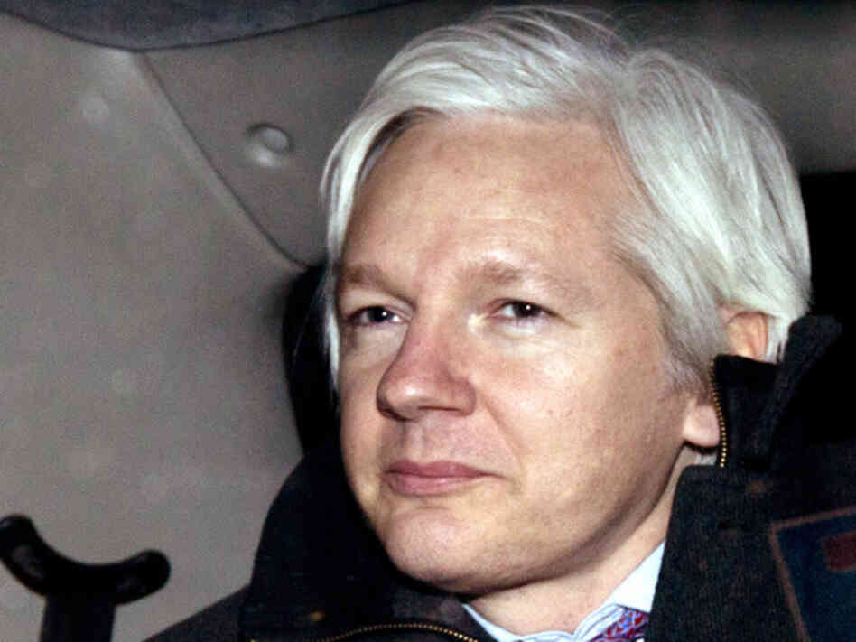 WikiLeaks founder Julian Assange is driven away in a taxi after leaving his hearing at the Supreme Court in London, Thursday, Feb. 2, 2012. WikiLeaks founder Julian Assange is driven away in a taxi after leaving his hearing at the Supreme Court in London, Thursday, Feb. 2, 2012.