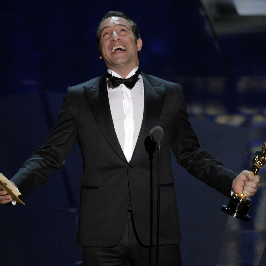 Jean Dujardin accepts the Oscar for best actor in a leading role for The Artist during the 84th Academy Awards on Sunday.