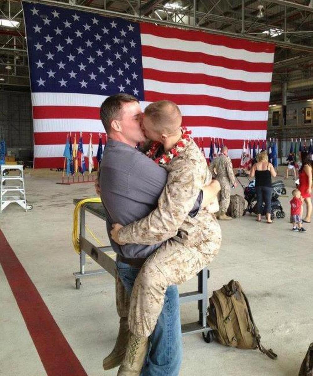 The kiss. That's Sgt. Brandon Morgan on the right. Dalan Wells on the left.