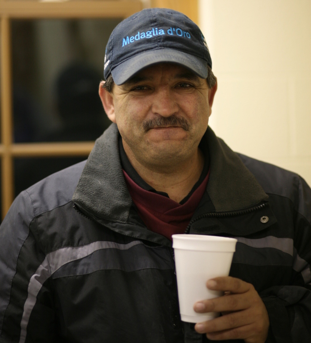 Eduardo Terrazas, with a cup of coffee brewed in the barn. It's the best, he says.