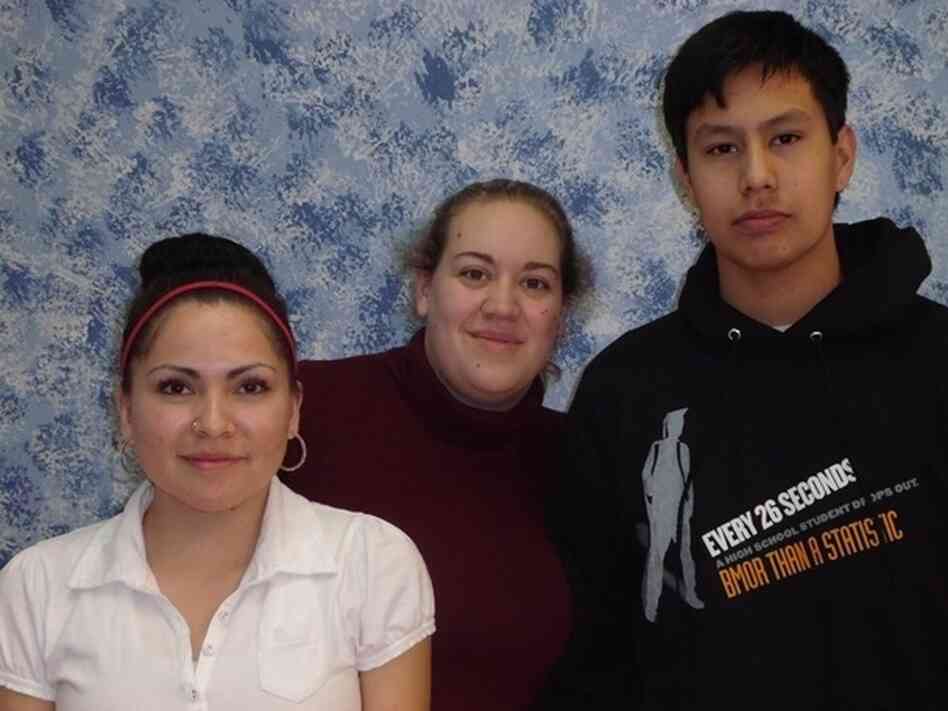 Feather Rae Colombe (from left) appeared in the Lakota student video More Than That. Kim Bos is a video technology teacher who helped produce the video. Student John Whirlwind Soldier directed the video.
