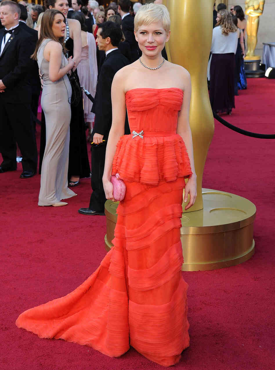 Michelle Williams with a pixie and a peplum. 
