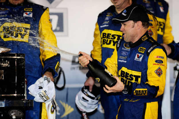 Matt Kenseth, driver of the #17 Best Buy Ford, celebrates in Victory Lane with champagne after winning the NASCAR Sprint Cup Series Daytona 500 at Daytona International Speedway on Tuesday.
