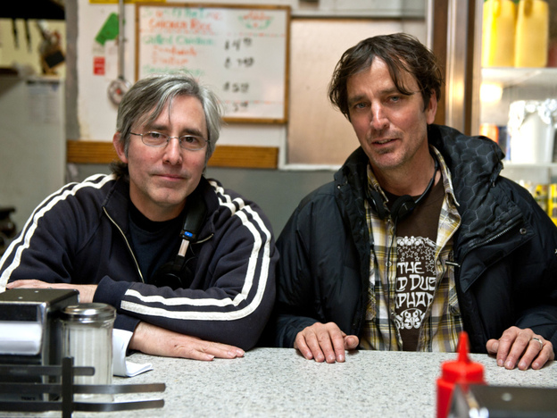 Director/screenwriter Paul Weitz (left) adapted Nick Flynn's 2004 memoir, Another Bulls- - - Night in Suck City. 