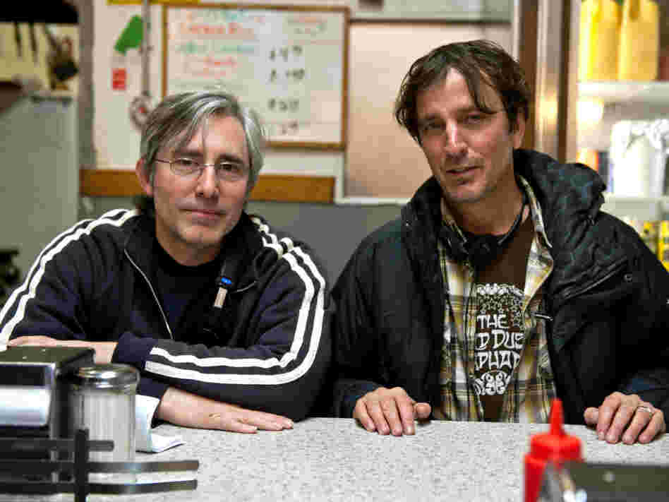 Director/screenwriter Paul Weitz (left) adapted Nick Flynn's 2004 memoir, Another Bulls- - - Night in Suck City. 