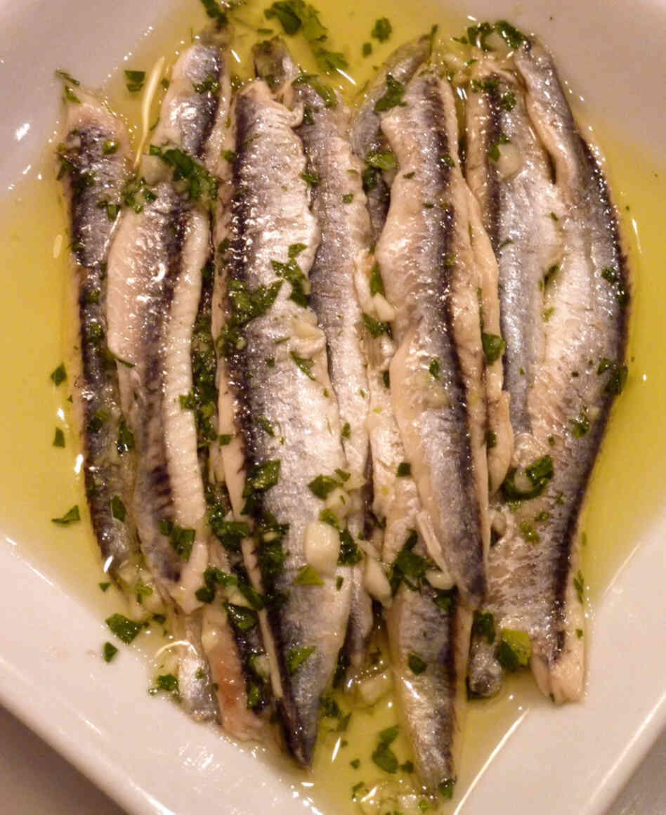 Boquerones, or vinegar-cured anchovies with garlic and parsley